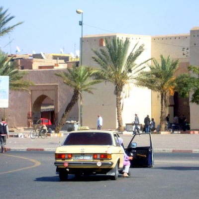 city wall with old Mercedes