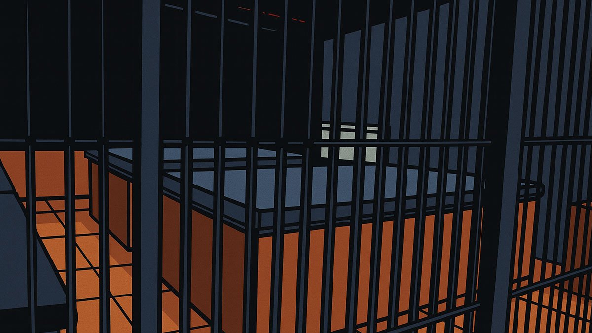 bed behind steel bars in gay sauna
